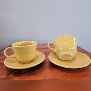 Set of Two Fiestaware tea cups and saucers.